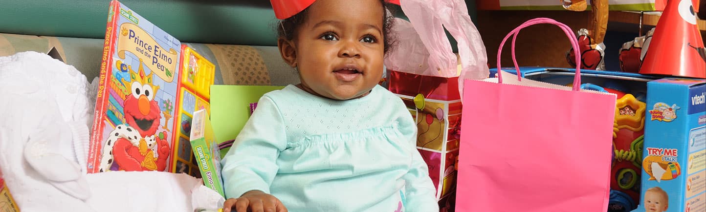 Raquel Allen celebrates her first birthday at Comer Children's Hospital, with family, friends and UChicago Medicine staff. Raquel was treated for biliary atresia and received part of a liver in a transplant from a living donor, Catherine Ortiz