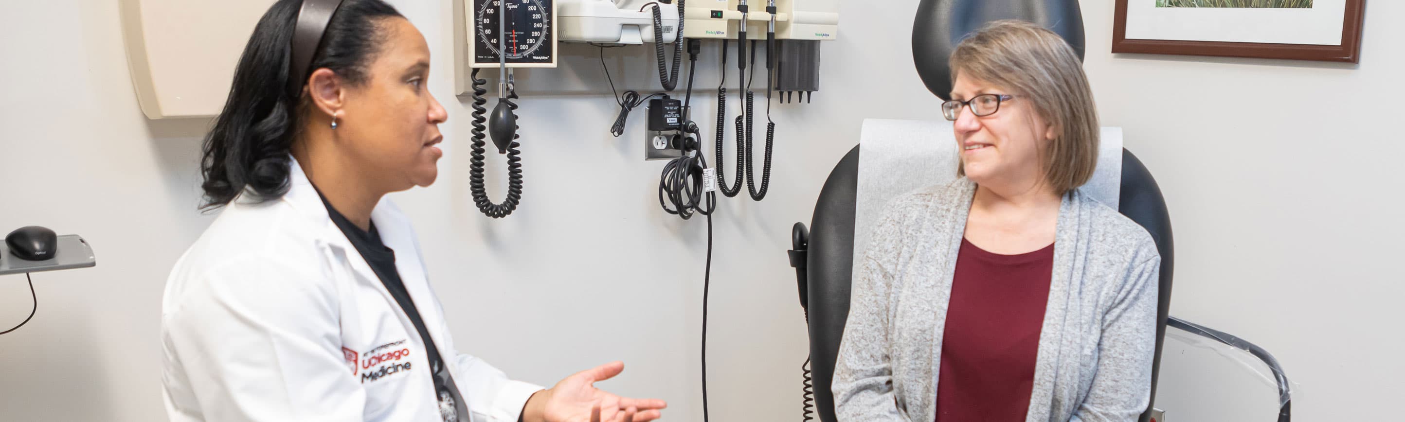 OB/GYN Jana Richards, MD, and employee Christine McMahon in clinic